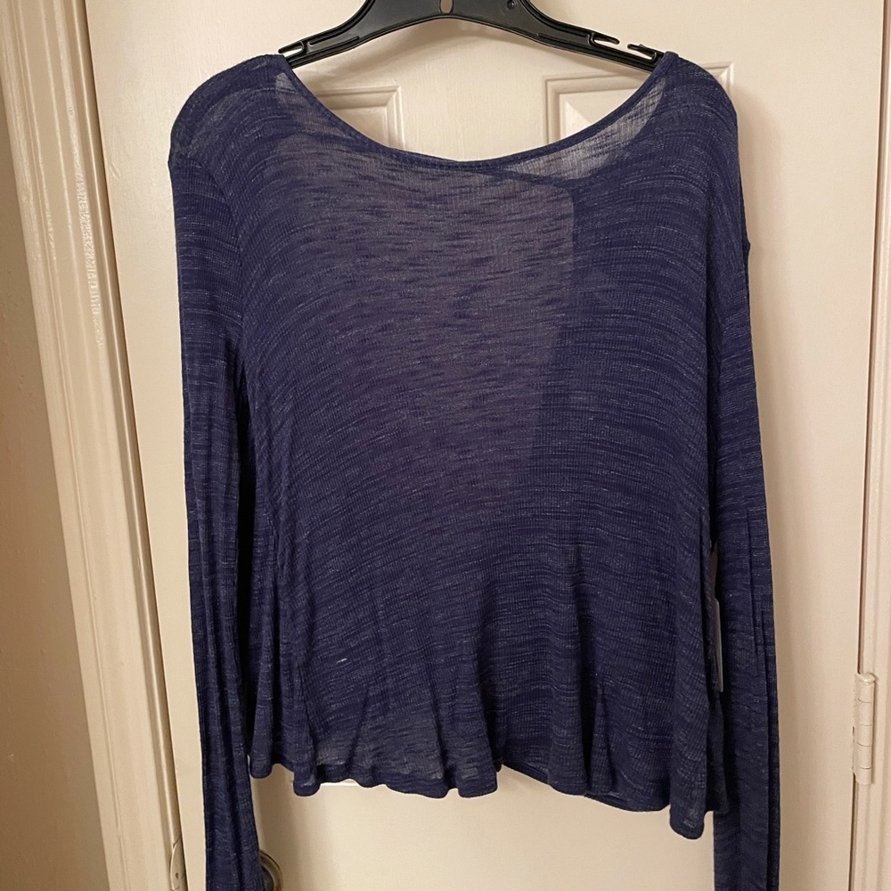 Open back, long sleeve blue top